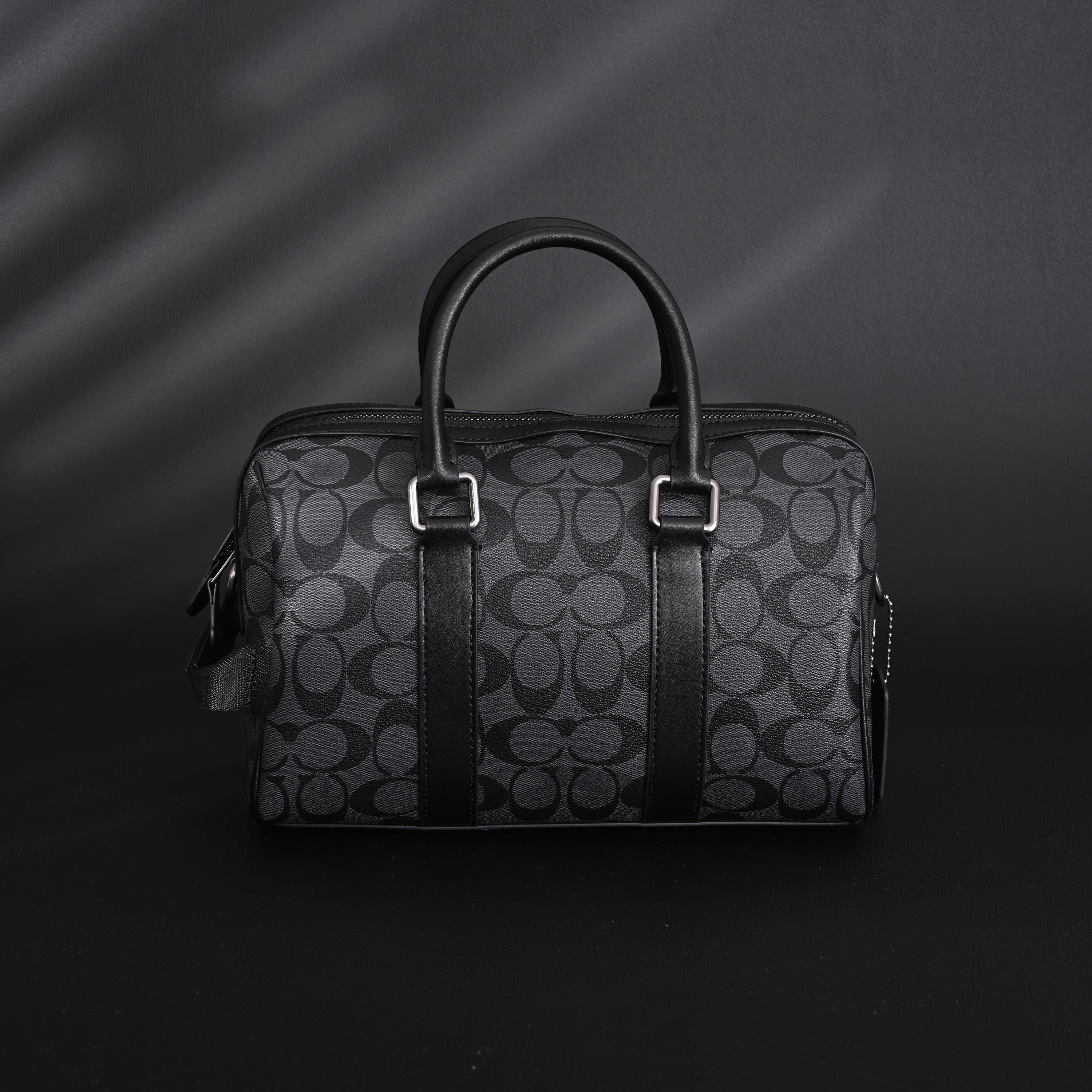 Coach Signature Duffel Bag – Black Monogram Canvas with Leather Trim